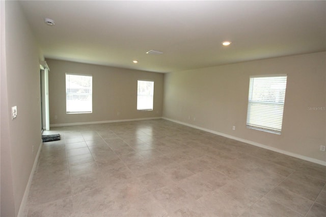 4071 Conestoga St, Port Charlotte, FL 33948 - unfurnished room with light tile patterned floors, baseboards, and recessed lighting