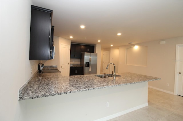 4071 Conestoga St, Port Charlotte, FL 33948 - kitchen featuring baseboards, a sink, appliances with stainless steel finishes, a peninsula, and recessed lighting