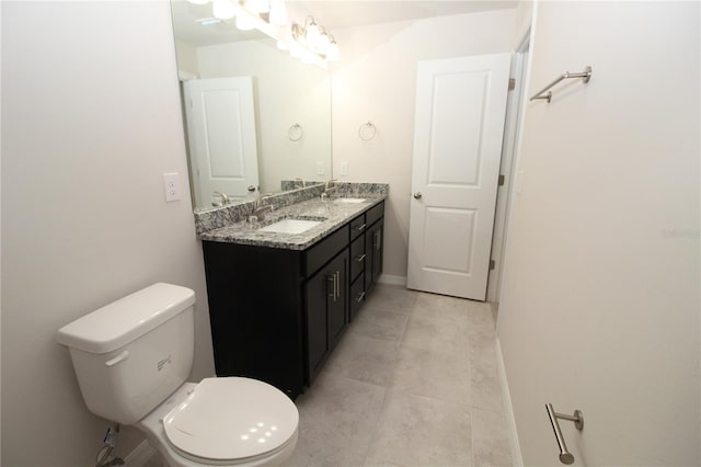 4071 Conestoga St, Port Charlotte, FL 33948 - bathroom featuring toilet, tile patterned floors, double vanity, and a sink