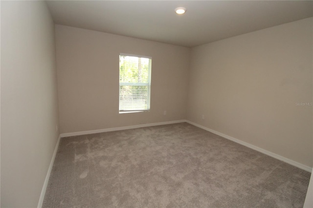 4071 Conestoga St, Port Charlotte, FL 33948 - carpeted spare room with baseboards