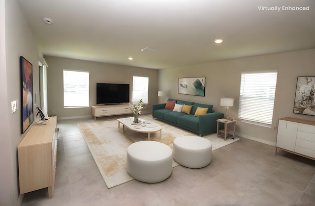 4071 Conestoga St, Port Charlotte, FL 33948 - living room featuring baseboards, light tile patterned floors, and recessed lighting