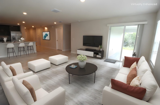 4071 Conestoga St, Port Charlotte, FL 33948 - living room with light wood finished floors and recessed lighting