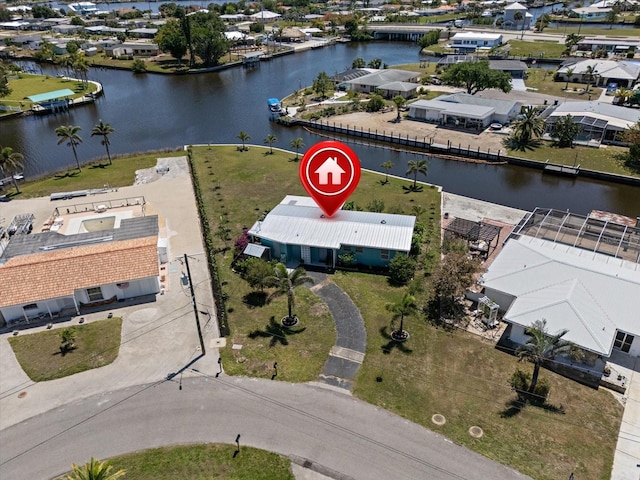 aerial view featuring a water view and a residential view