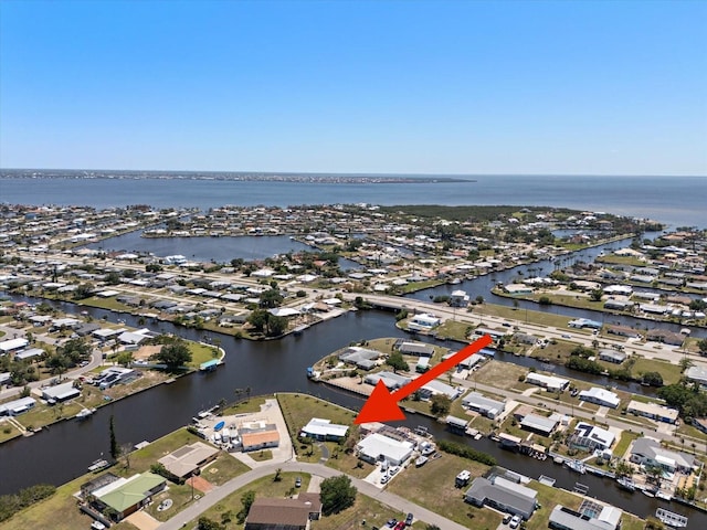 aerial view featuring a water view and a residential view