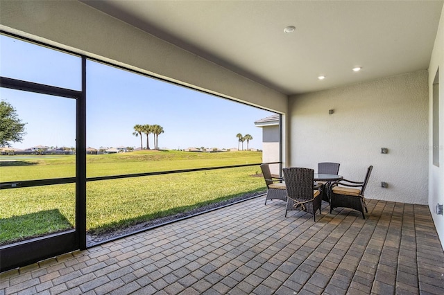 14413 Heritage Landing Blvd, Punta Gorda, FL 33955 - sunroom with outdoor dining space