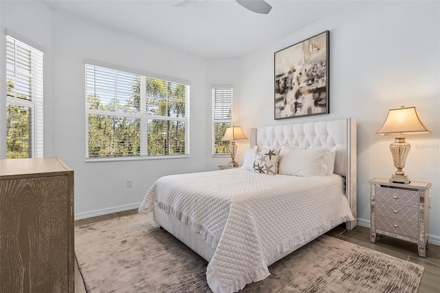 14413 Heritage Landing Blvd, Punta Gorda, FL 33955 - bedroom featuring baseboards, wood finished floors, and ceiling fan