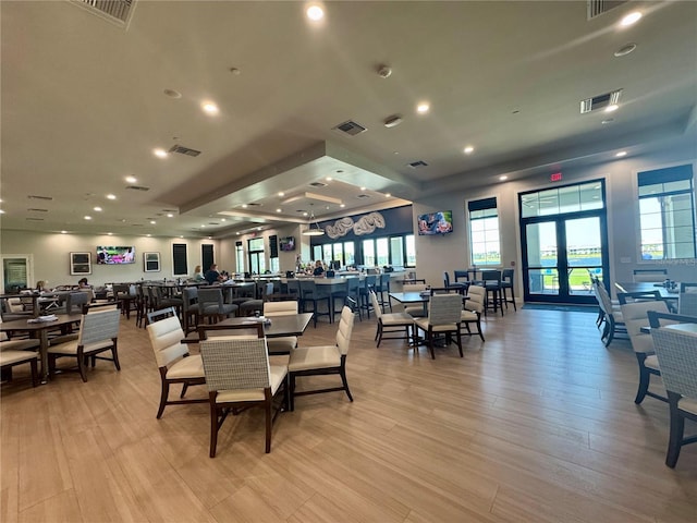 14413 Heritage Landing Blvd, Punta Gorda, FL 33955 - dining room with light wood finished floors and recessed lighting