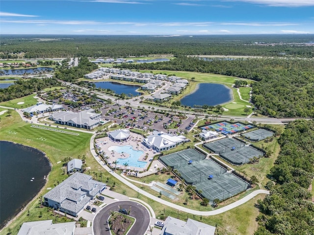 14413 Heritage Landing Blvd, Punta Gorda, FL 33955 - aerial view of property's location with a large body of water, a forest, and a pool