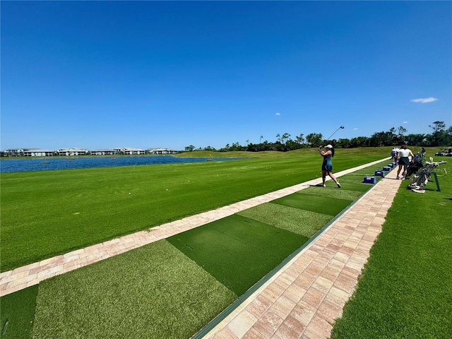 14413 Heritage Landing Blvd, Punta Gorda, FL 33955 - surrounding community featuring a water view, a yard, and view of golf course