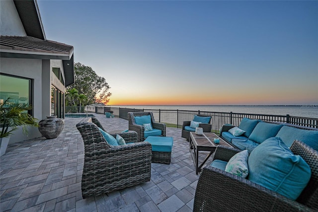 1820 Jamaica Way, Punta Gorda, FL 33950 - patio terrace at dusk with outdoor lounge area and a water view