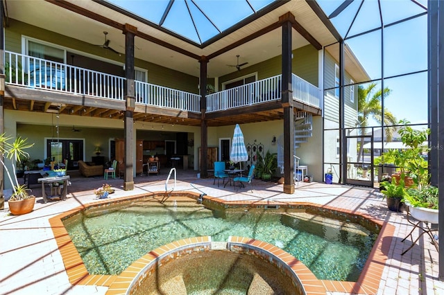 3712 Balboa Ct, Punta Gorda, FL 33983 - back of house with a balcony, a ceiling fan, a patio, and a pool with connected hot tub