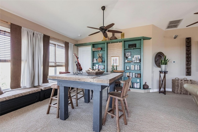 3712 Balboa Ct, Punta Gorda, FL 33983 - dining space featuring a ceiling fan, light carpet, and vaulted ceiling