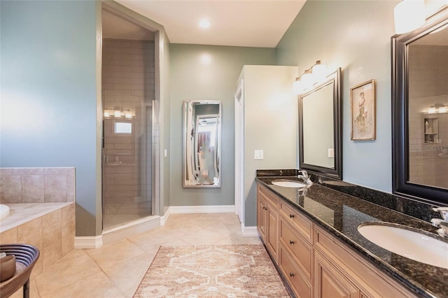 3712 Balboa Ct, Punta Gorda, FL 33983 - full bath featuring a bath, double vanity, tile patterned floors, and baseboards