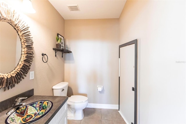 3712 Balboa Ct, Punta Gorda, FL 33983 - bathroom with toilet, tile patterned floors, and vanity