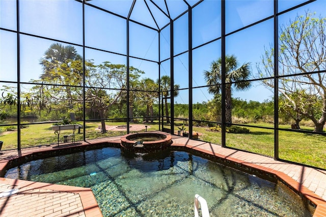 3712 Balboa Ct, Punta Gorda, FL 33983 - view of swimming pool with glass enclosure, a yard, and a pool with connected hot tub