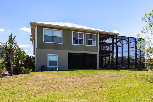 3712 Balboa Ct, Punta Gorda, FL 33983 - rear view of house with a lawn and metal roof