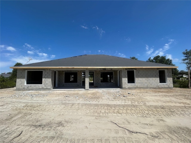 property under construction featuring covered porch