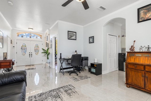 16450 Bauers Ave, Port Charlotte, FL 33954 - entrance foyer featuring arched walkways, marble finish floor, ornamental molding, and visible vents