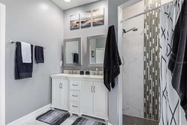 16450 Bauers Ave, Port Charlotte, FL 33954 - bathroom with a sink, marble finish floor, baseboards, and a marble finish shower