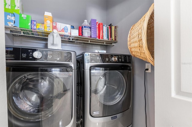 16450 Bauers Ave, Port Charlotte, FL 33954 - washroom featuring independent washer and dryer and laundry area