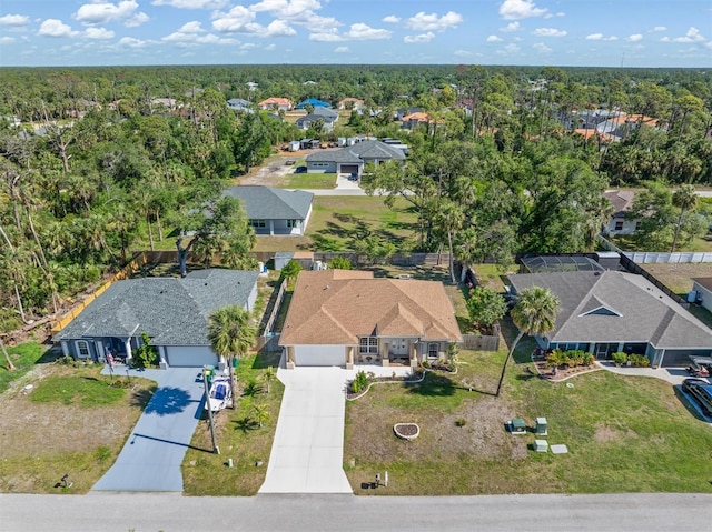 16450 Bauers Ave, Port Charlotte, FL 33954 - drone / aerial view with a forest view and a residential view