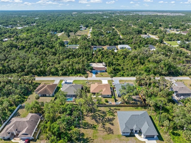 16450 Bauers Ave, Port Charlotte, FL 33954 - birds eye view of property with a view of trees and a residential view