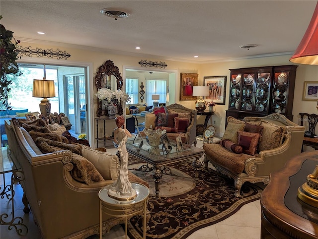 1233 Dewhurst St, Port Charlotte, FL 33952 - living area with tile patterned flooring, visible vents, and ornamental molding