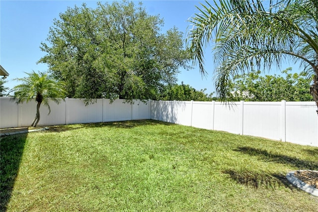 view of yard featuring a fenced backyard
