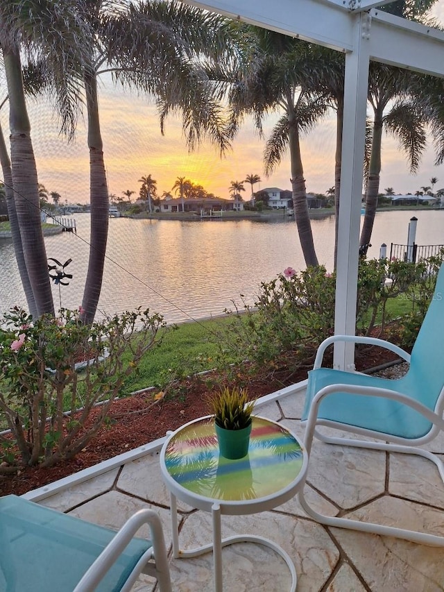 view of patio / terrace featuring a water view