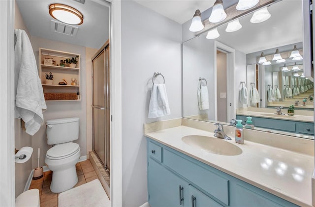 1701 Beach Rd Unit 305, Englewood, FL 34223 - bathroom with baseboards, tile patterned floors, toilet, a shower stall, and visible vents