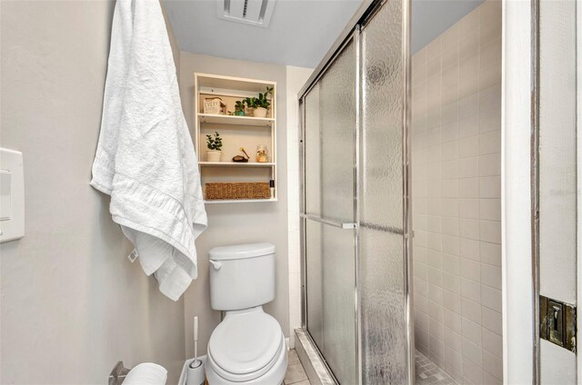 1701 Beach Rd Unit 305, Englewood, FL 34223 - bathroom with toilet, visible vents, and a stall shower