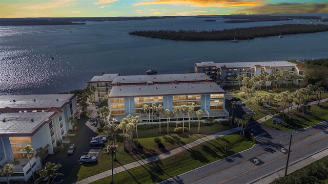 1701 Beach Rd Unit 305, Englewood, FL 34223 - aerial view at dusk with a water view