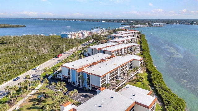 1701 Beach Rd Unit 305, Englewood, FL 34223 - drone / aerial view featuring a water view