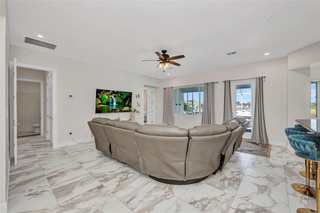 4213 Gardner Dr, Port Charlotte, FL 33952 - living room with a ceiling fan, baseboards, light marble finish flooring, and recessed lighting