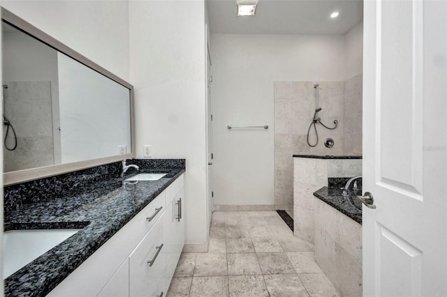 4213 Gardner Dr, Port Charlotte, FL 33952 - full bath with walk in shower, double vanity, baseboards, tiled tub, and recessed lighting