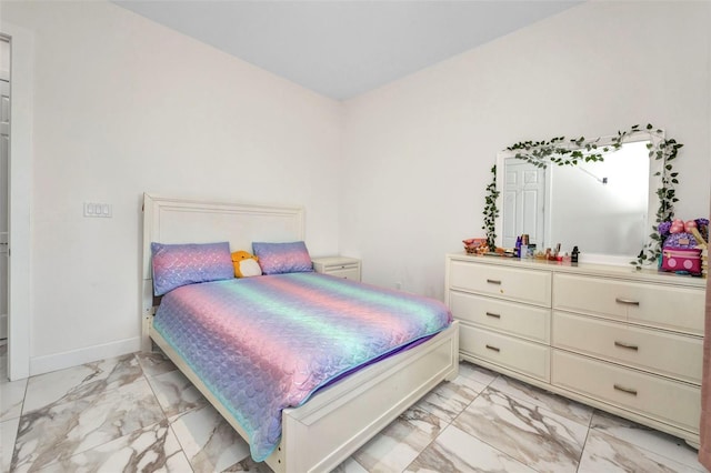 4213 Gardner Dr, Port Charlotte, FL 33952 - bedroom featuring light marble finish floors and baseboards