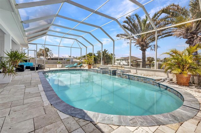 4213 Gardner Dr, Port Charlotte, FL 33952 - view of pool featuring a patio area, a pool with connected hot tub, and a lanai