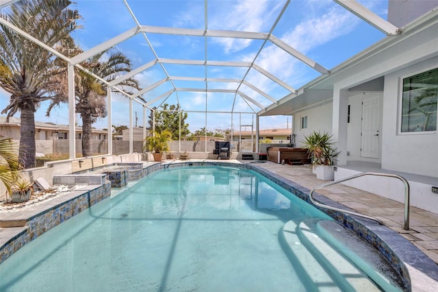 4213 Gardner Dr, Port Charlotte, FL 33952 - view of pool featuring a patio area, glass enclosure, and a pool with connected hot tub
