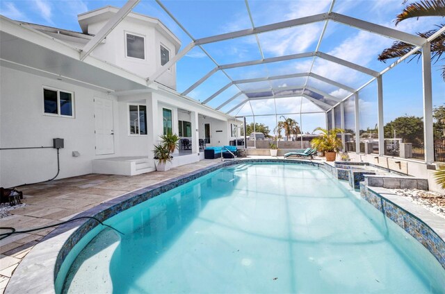4213 Gardner Dr, Port Charlotte, FL 33952 - view of swimming pool with a patio, a pool with connected hot tub, and a lanai