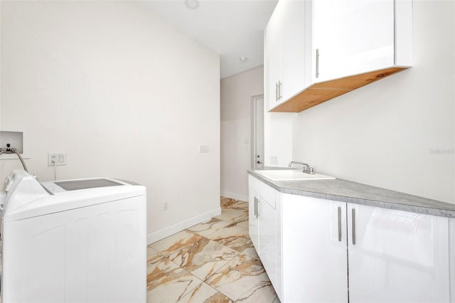 4213 Gardner Dr, Port Charlotte, FL 33952 - laundry area featuring light marble finish flooring, cabinet space, baseboards, and separate washer and dryer