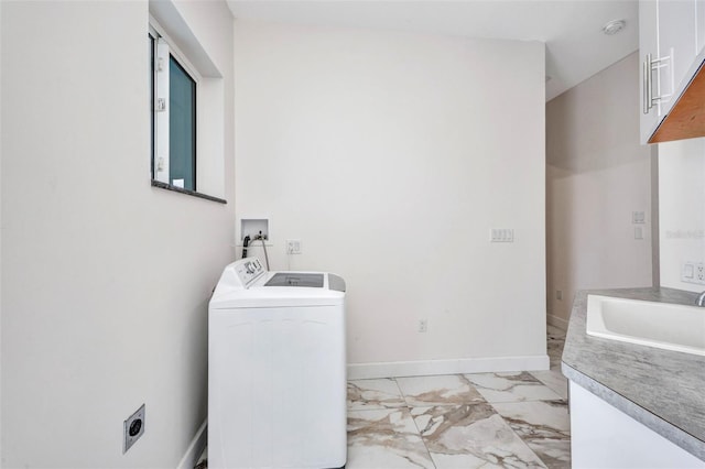 4213 Gardner Dr, Port Charlotte, FL 33952 - laundry room with hookup for a washing machine, light marble finish flooring, baseboards, and cabinet space
