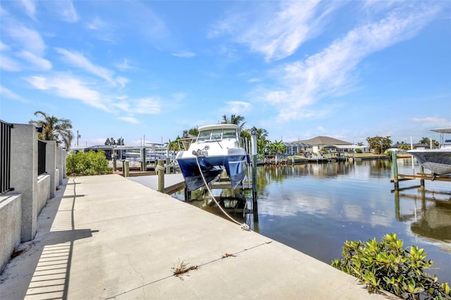 4213 Gardner Dr, Port Charlotte, FL 33952 - dock area featuring boat lift and a water view