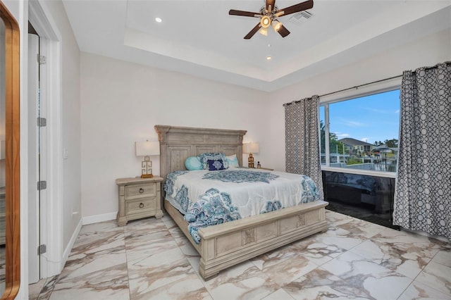 4213 Gardner Dr, Port Charlotte, FL 33952 - bedroom featuring light marble finish flooring, recessed lighting, baseboards, ceiling fan, and a tray ceiling