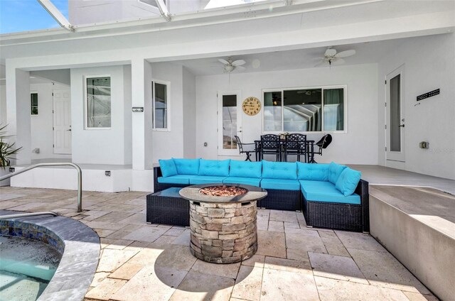 4213 Gardner Dr, Port Charlotte, FL 33952 - view of patio / terrace featuring an outdoor living space with a fire pit, a ceiling fan, and outdoor dining area
