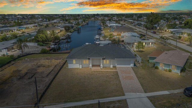 4213 Gardner Dr, Port Charlotte, FL 33952 - aerial view at dusk of a residential view and a water view