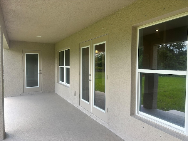 26209 Madras Ct, Punta Gorda, FL 33983 - unfurnished sunroom with french doors