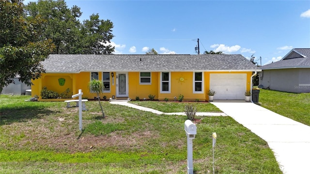 582 Ridgewood St NW, Port Charlotte, FL 33952 - single story home featuring an attached garage, concrete driveway, a front yard, and a shingled roof