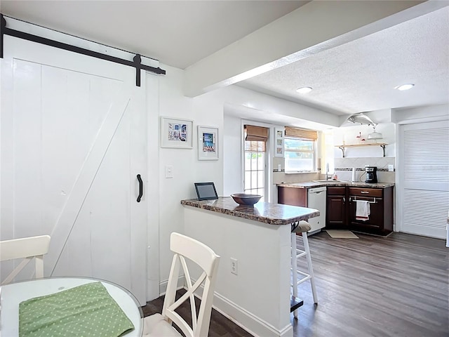 582 Ridgewood St NW, Port Charlotte, FL 33952 - kitchen with dishwasher, dark wood-type flooring, a breakfast bar area, a sink, and open shelves