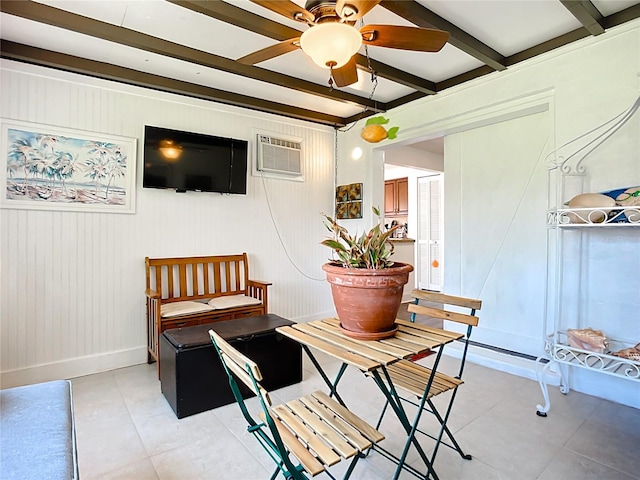 582 Ridgewood St NW, Port Charlotte, FL 33952 - living area with beamed ceiling, baseboards, a wall mounted AC, light tile patterned floors, and ceiling fan