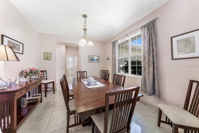 dining space with light tile patterned floors